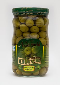 Processed green olives right with the kernel
