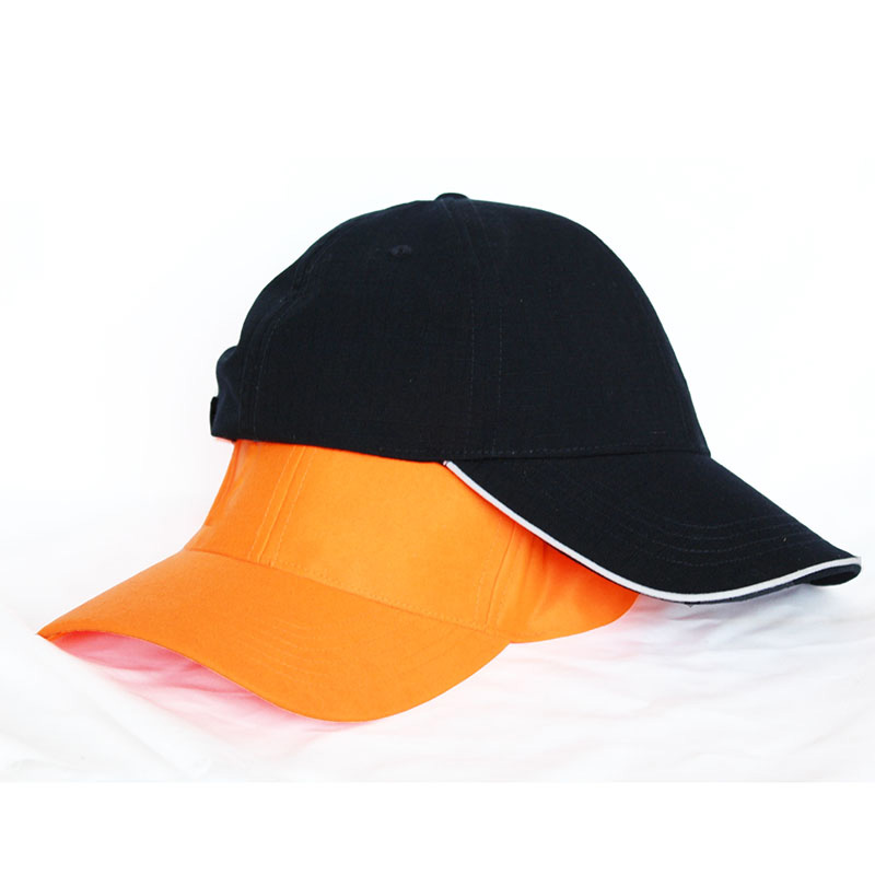 Orange, black peaked cap