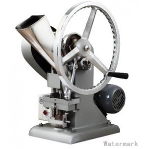 SINGLE IMPULSE-TYPE TABLET PRESSING MACHINE