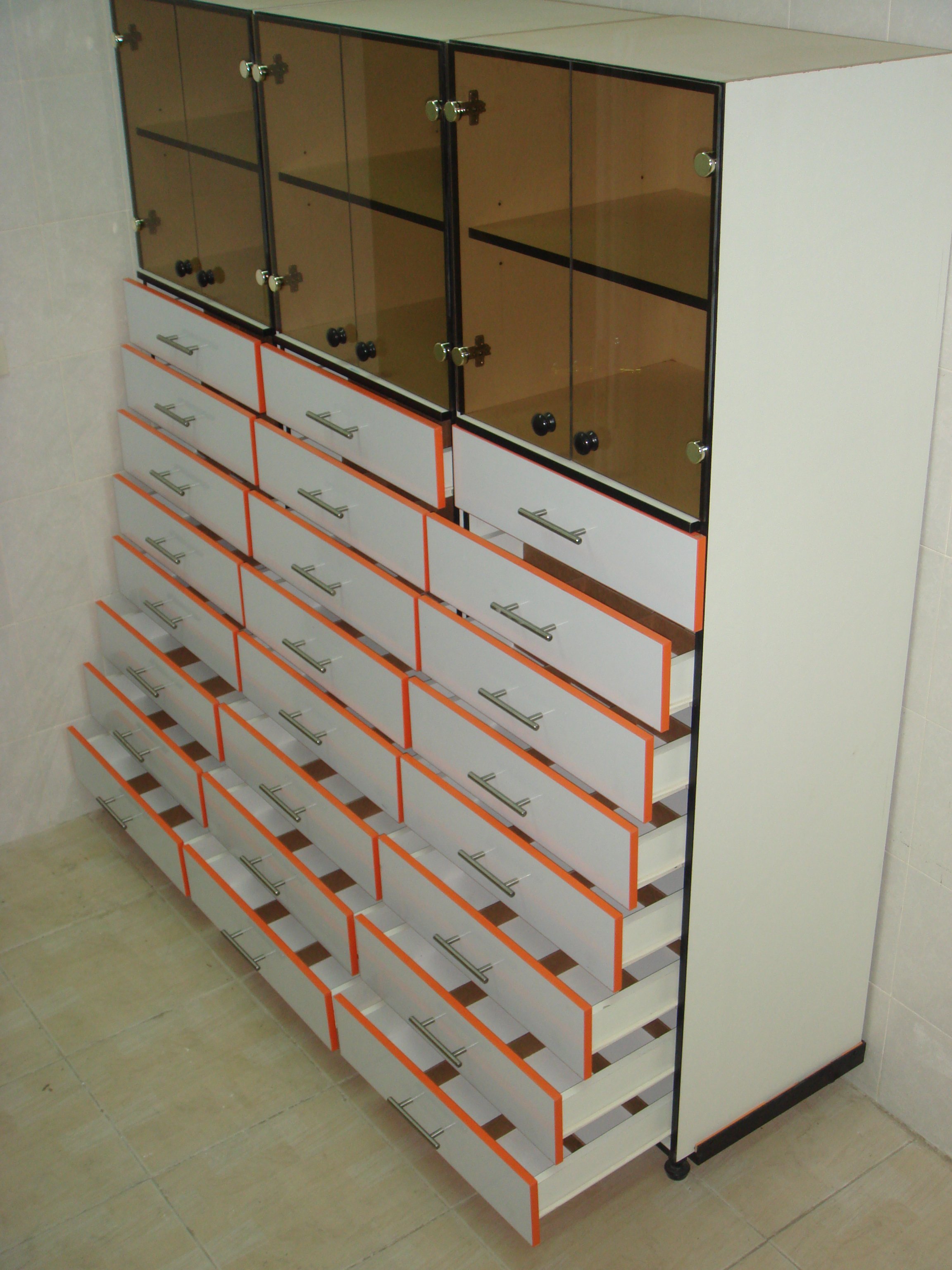 24 drawer glass storage cupboard