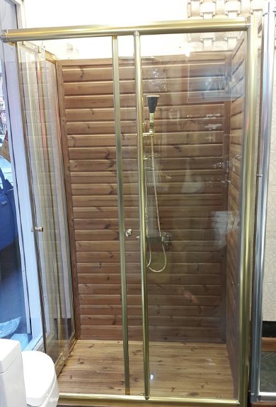 Framed shower cabin