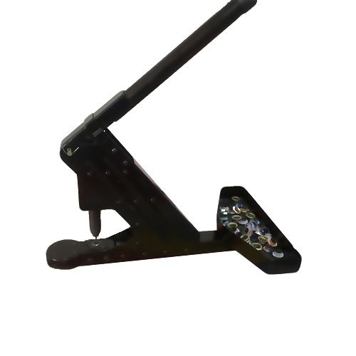 Magnetic banner punching machine