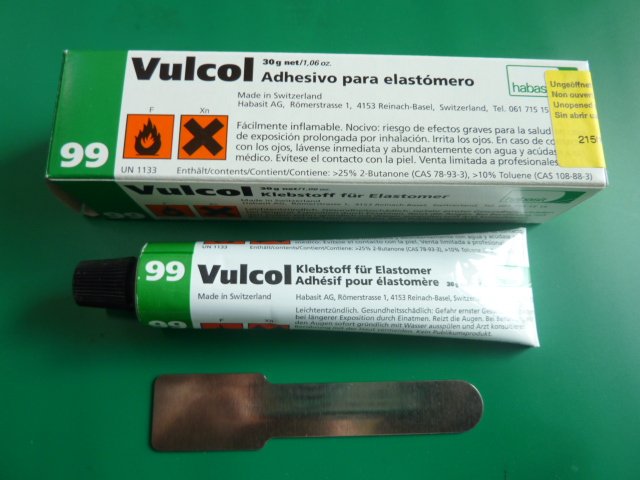 Adhesive belt attachment