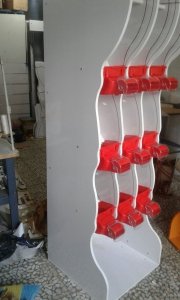 The three-story stand has nine tanks